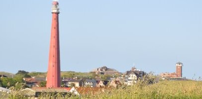 De vuurtoren van Texel op de achtergrond